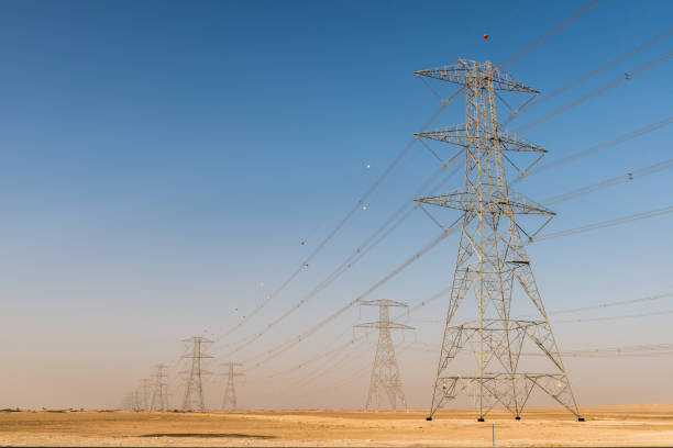 istock Giant electricity cables in the desert 909597668