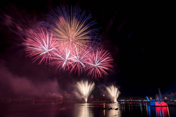 istock Bright and colorful fireworks against a black night sky.Fireworks for new year. 909598514