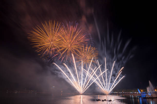 istock Bright and colorful fireworks against a black night sky.Fireworks for new year. 909598604