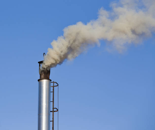 istock Industrial chimney with gray smoke 909605766