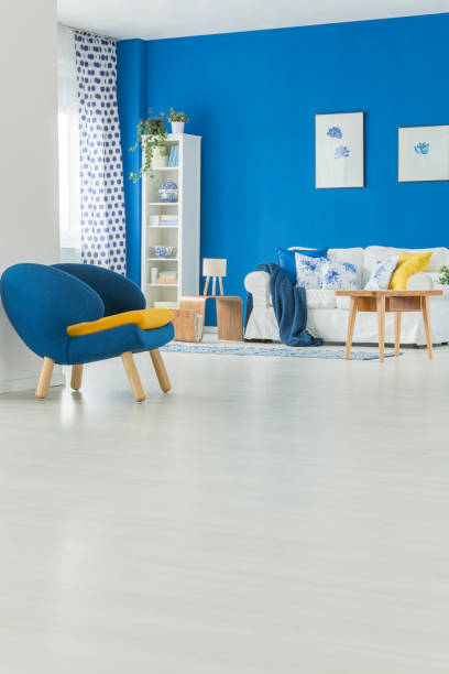istock Blue armchair in living room 909609262