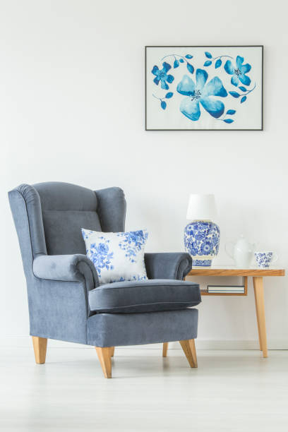 istock Apartment interior with cozy armchair 909609276