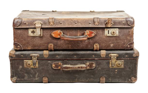 istock Old suitcases isolated on white background 909613226