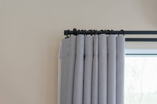 istock closed up of beautiful  grey curtain 909617346