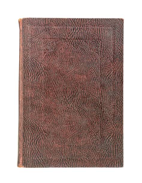 istock Old book's cover isolated on white background 909621060