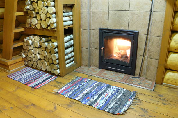 istock Fireplace in the country house. 909628424