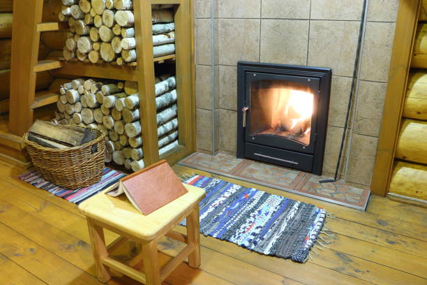 istock Fireplace in the country house. 909628518