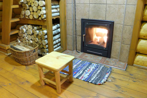 istock Fireplace in the country house. 909628626