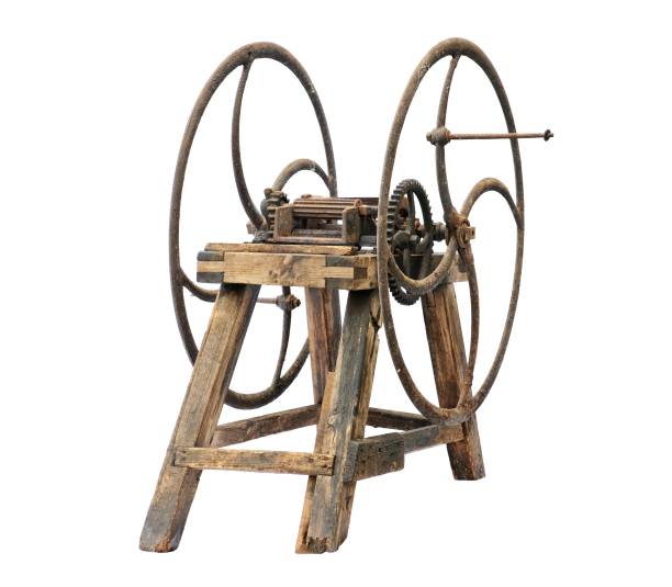istock Old wooden chaff cutter isolated on white background 909628682