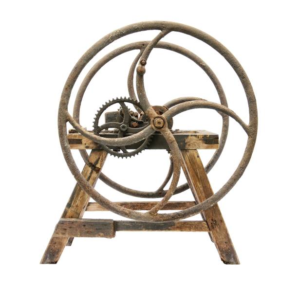 istock Old wooden chaff cutter isolated on white background 909628776