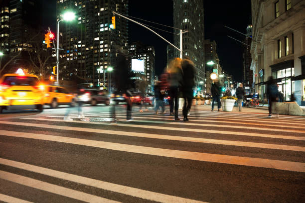 istock Manhattan motion blurred citylife at flatiron building 909629830