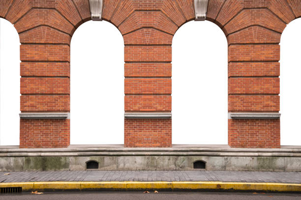 Ancient orange brick wall and interior vintage arch windows frame white white blank background in window display shop outside and foot path.