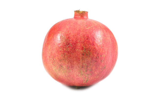 istock Pomegranate, fresh raw fruit pomegranate isolated on white background, with clipping path. 909635582