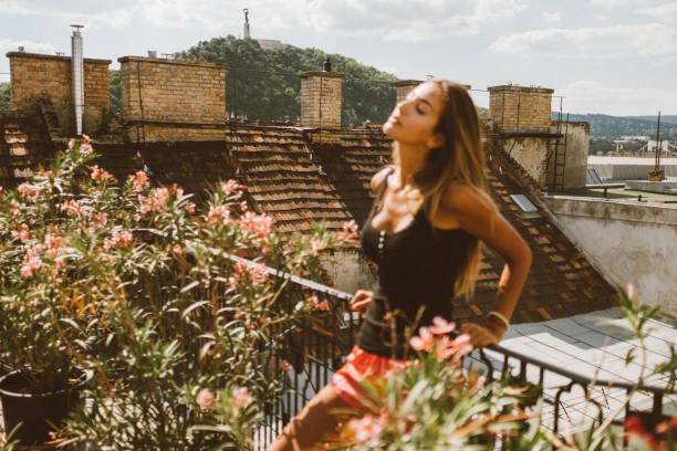 istock Girl enjoying the sunshine 909645714