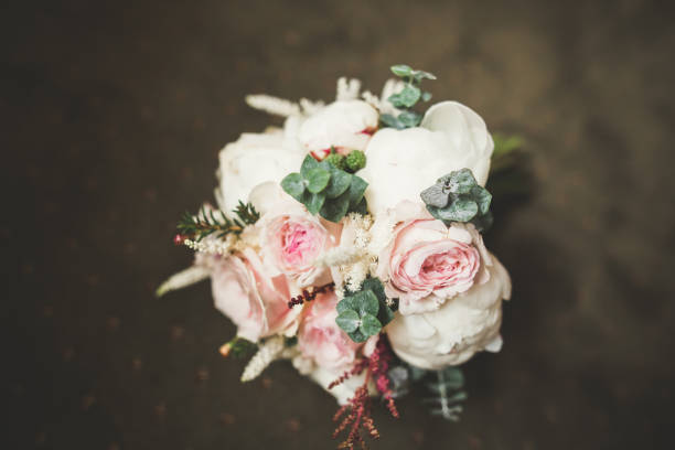 istock Beautiful wedding bouquet with different flowers, roses 909650422