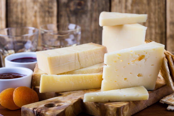 cheese, fruit jam, nuts and wine on wooden board - italian cuisine wine food pasta imagens e fotografias de stock