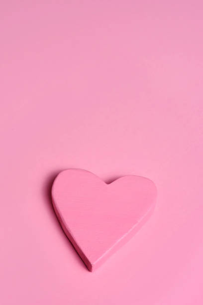 istock pink heart on a pink background 909655110
