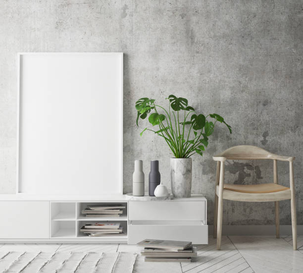 istock mock up poster frame in hipster interior background, scandinavian style, 3D render 909655674