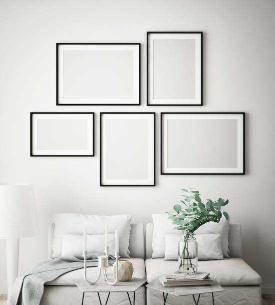 istock mock up poster frame in hipster interior background, scandinavian style, 3D render 909655856