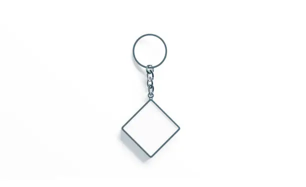 Photo of Blank metal rhombus white key chain mock up top view