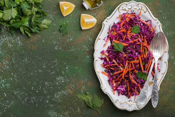 istock Red cabbage coleslaw salad with carrots 909671822