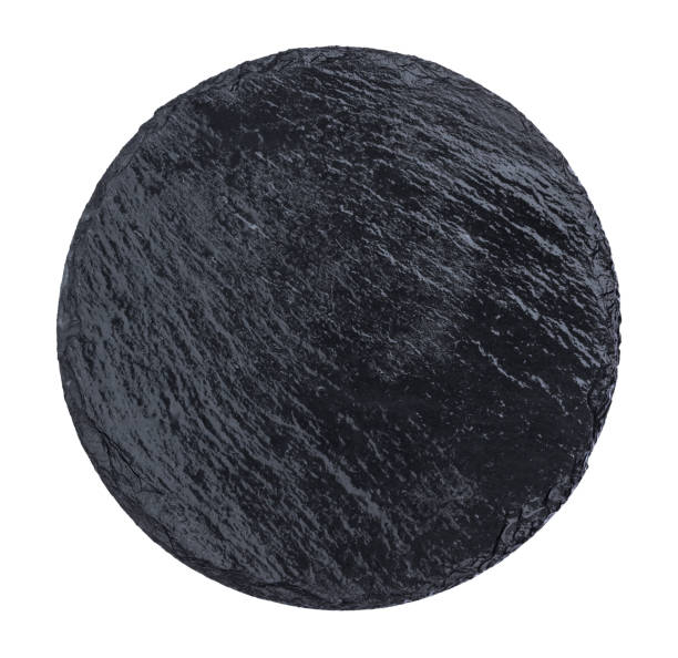 istock Round slate plate isolated on white background 909680572