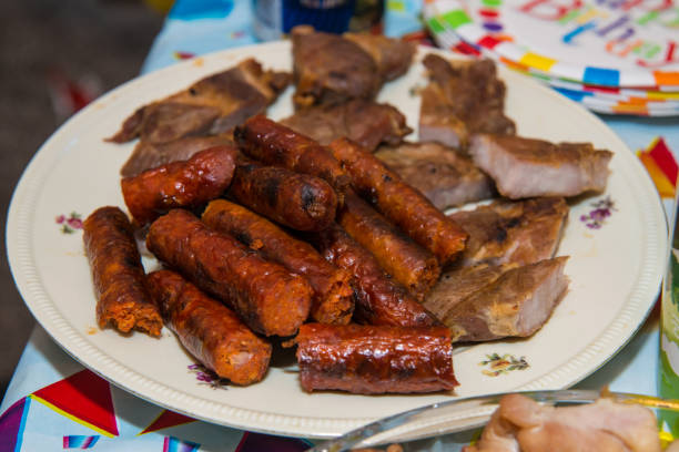 istock Grilled sausage and meat 909680994