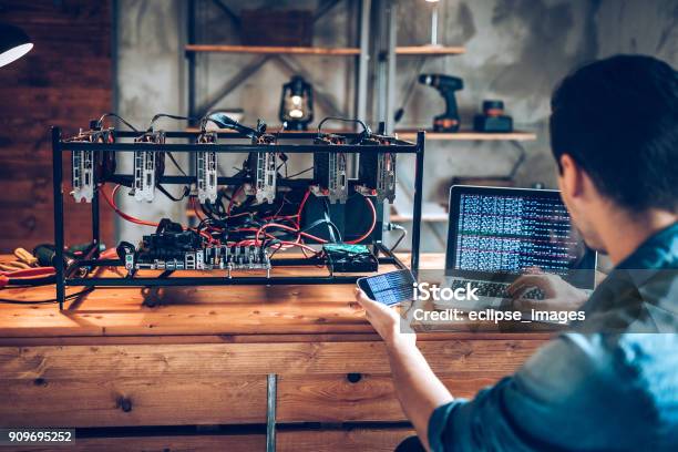Programmer Preparing Mining Rig With Gpu Stock Photo - Download Image Now - Cryptocurrency Mining, Cryptocurrency, Bitcoin