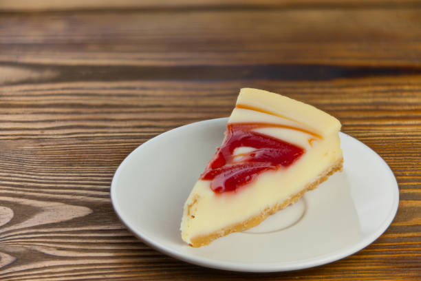 istock delicious cheesecake with strawberries on  plate 909698810