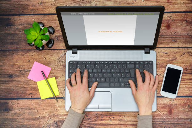 istock Woman working on her laptop with blank copy space screen for advertising text message in office 909700036