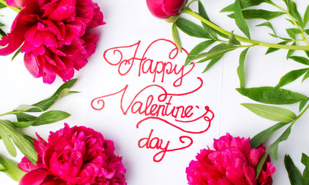 istock Happy Valentines day card with red roses on white 909701240