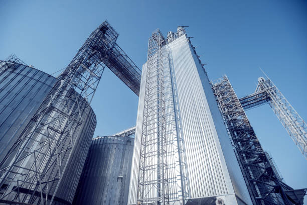 istock Modern silos for storing grain harvest. Agriculture. 909703976