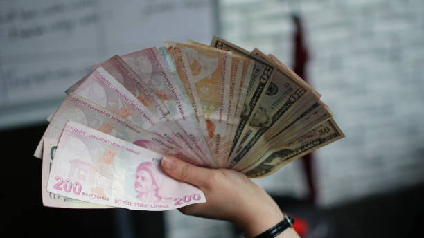 istock Turkish Lira and US Dollar Banknotes 909714136