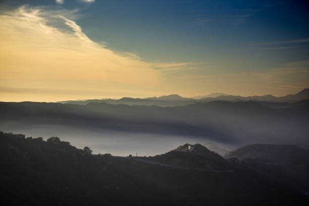 istock Hazy Sunset Over Santa Monica Mountains 909716094