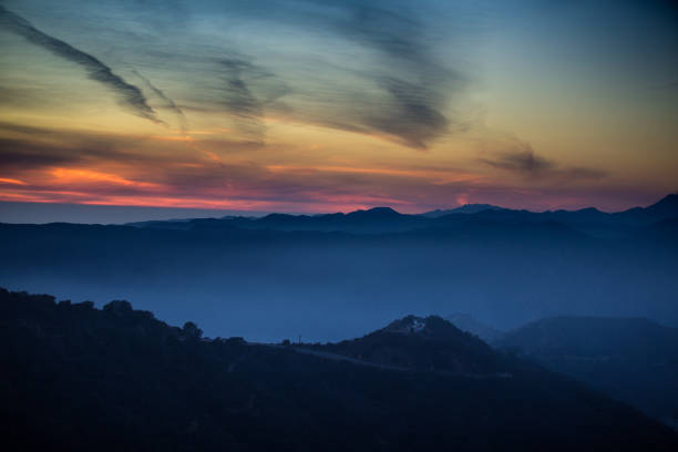 A hazy sunset over the Santa Monica Mountains in Malibu, California. Part of a series.