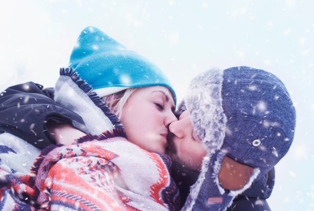 istock Happy couple outdoors in winter 909718448