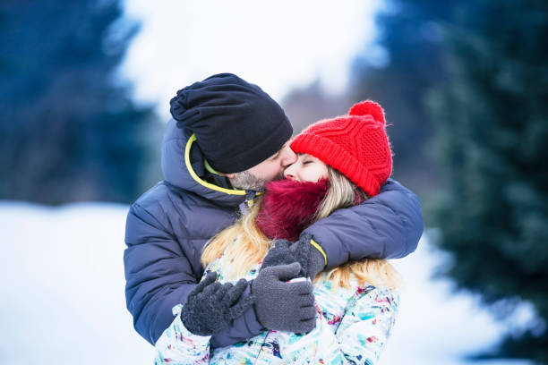 istock Happy couple outdoors in winter 909718824
