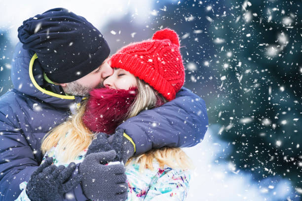 istock Happy couple outdoors in winter 909718830