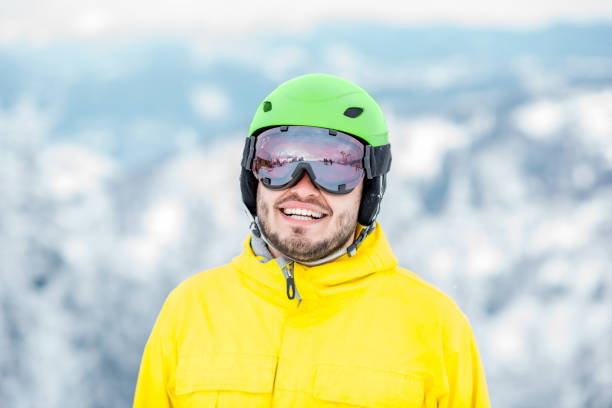 istock Snowboarder portrait outdoors 909725146