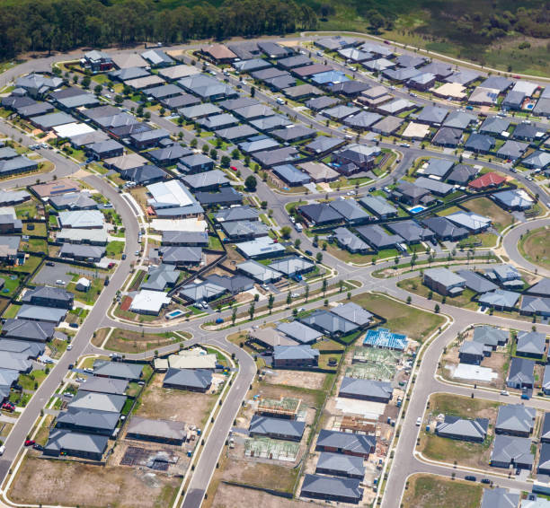 Australian Housing Development - Newcastle Australia Housing development in Fletcher - Newcastle. New houses in various stages of construction. newcastle new south wales photos stock pictures, royalty-free photos & images