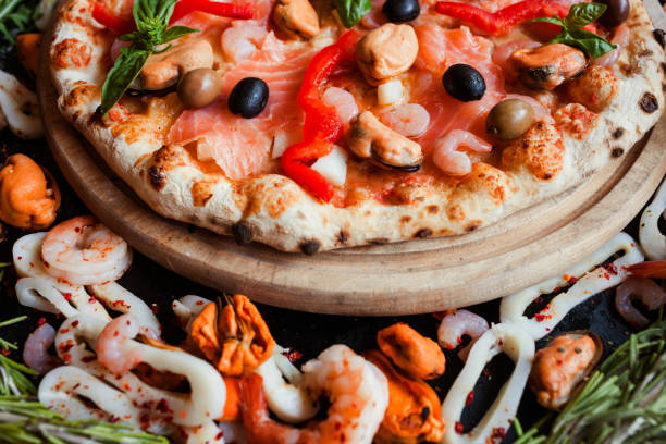 istock mediterranean pizza seafood olive classical recipe 909729398