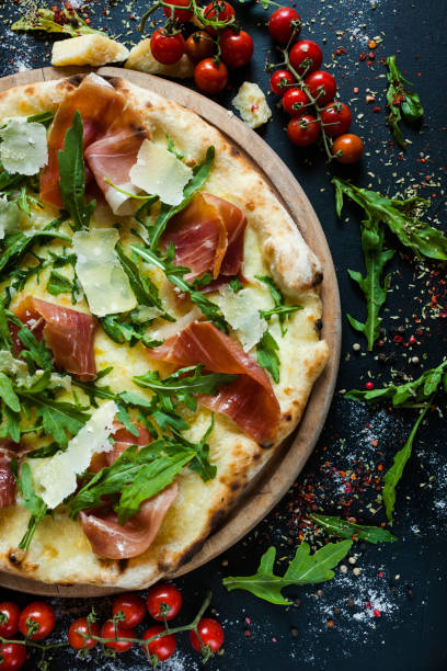istock salmon and arugula pizza tasty restaurant meal 909729538