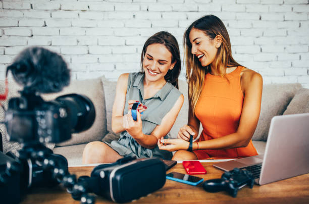 istock Two women reviewing smart watches 909730138