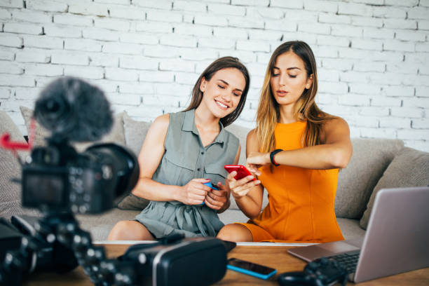 istock Two women reviewing smart watches 909730140