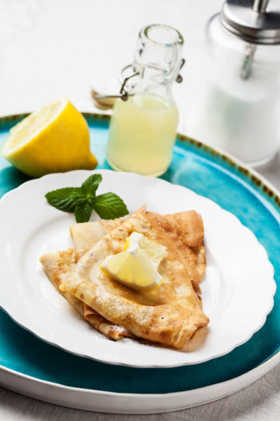 istock English-style pancakes with lemon and sugar 909738608