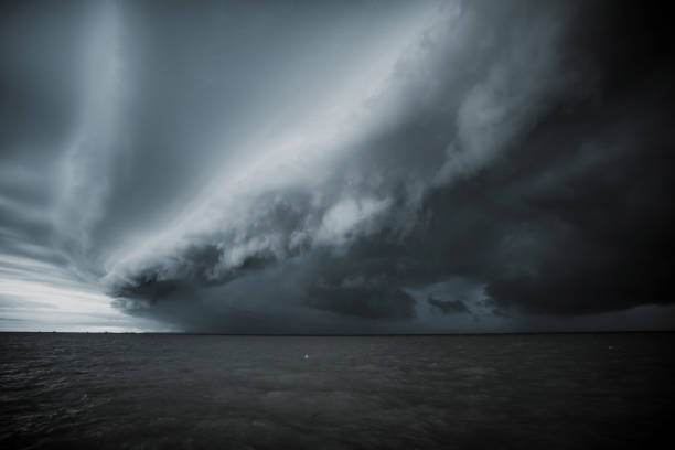 istock Cloudy storm in the sea before the rain. tornado storms cloud above the sea. 909748662