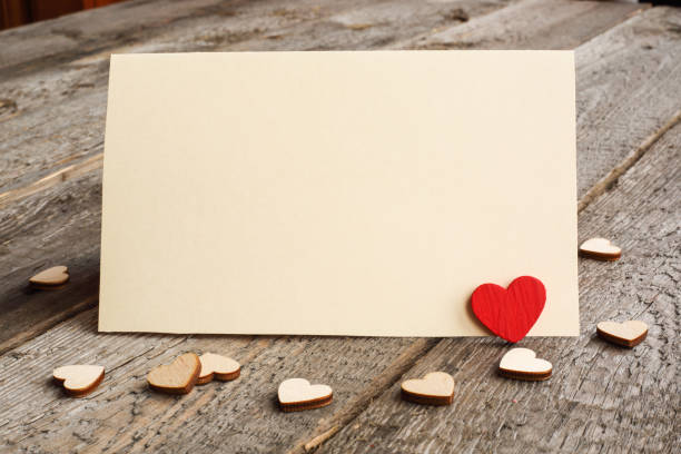 istock Blank greeting card and hearts 909756414