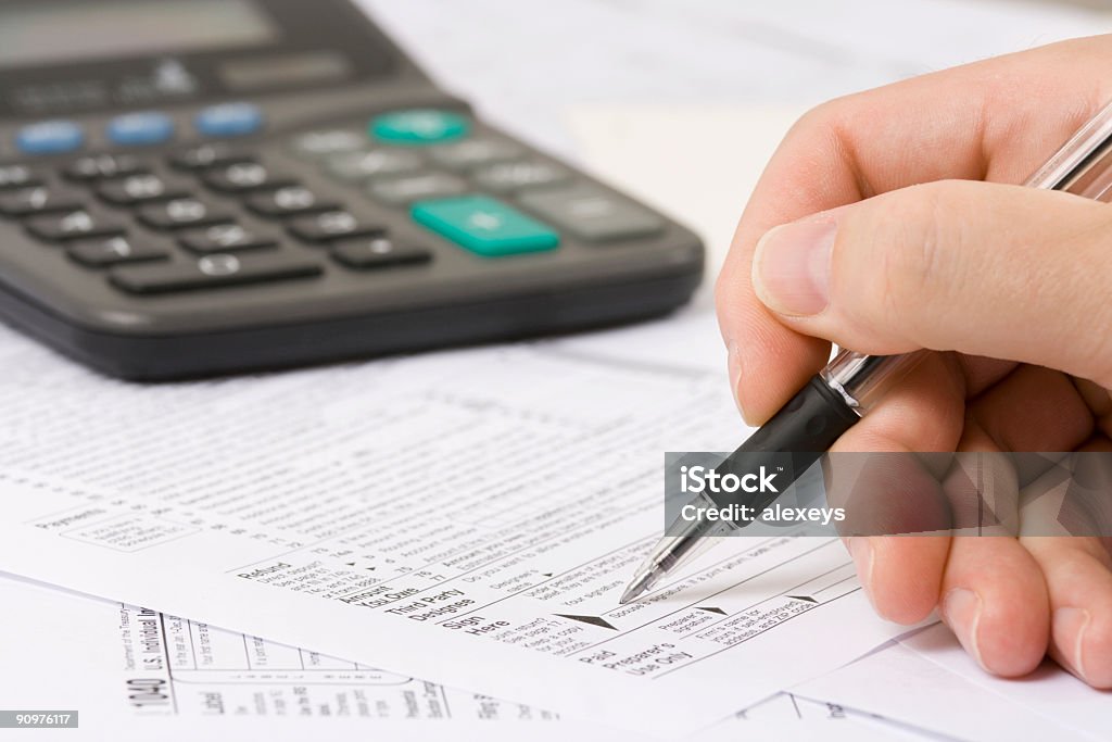 Filing taxes  Filing Documents Stock Photo