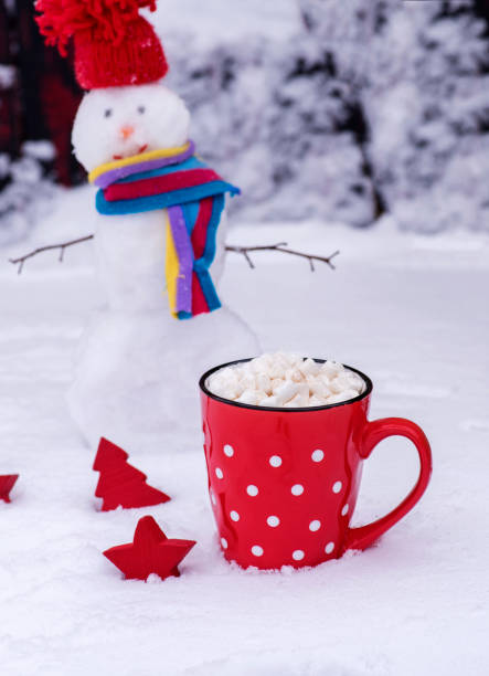 istock mug with white polka dots with hot chocolate and marshmallows 909762008