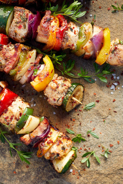 istock Grilled meat and vegetable skewers 909775694